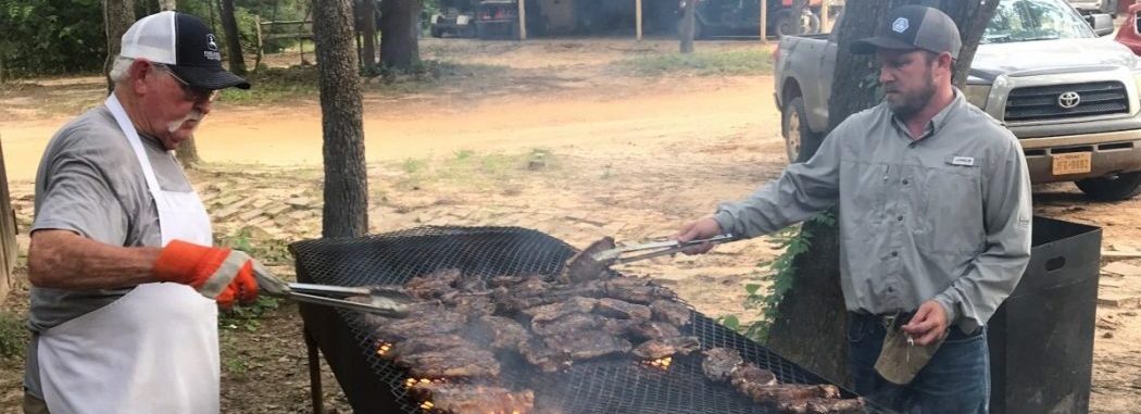 Truman and Charlie cooking ~ 140 steaks